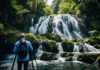 Wasserfall und Fotograf